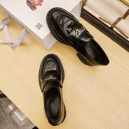 PRADA 26S PENNY LOAFERS 55MM IN DARK GREEN PATENT CALFSKIN