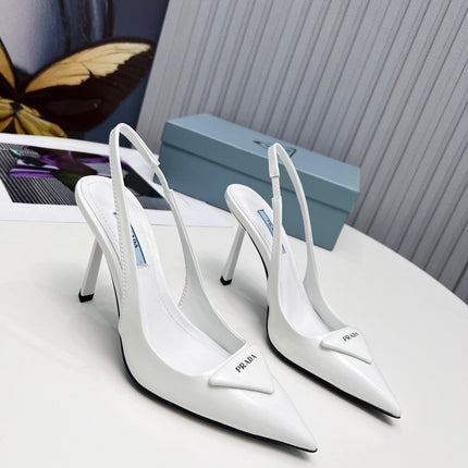 PRADA 26S SLINGBACK PUMPS STILETTO HEEL 95MM IN WHITE PATENT CALFSKIN LOGO