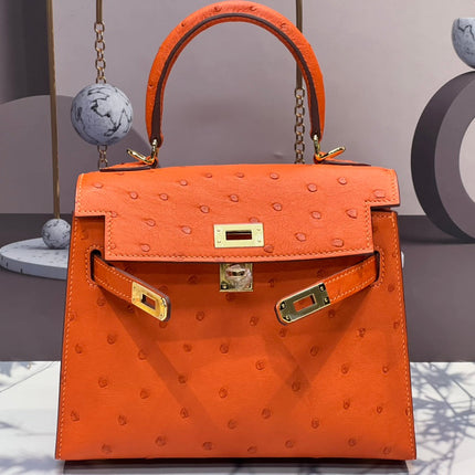 KELLY BAG 20 IN FIRE ORANGE OSTRICH LEATHER WITH GOLD HARDWARE