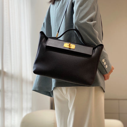 MINI 24/24 29CM IN BLACK EVERCOLOR CALFSKIN GOLD KELLY BUCKLE