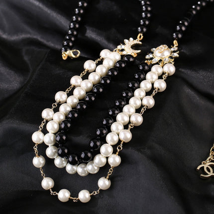 CHANEL 25S CHAIN BELT IN WHITE AND BLACK PEARL 614477