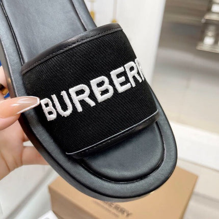 BURBERRY 26S SLIDE SANDALS IN BLACK CALFSKIN AND FABRIC