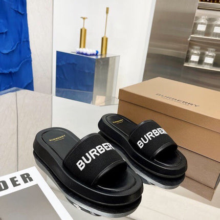 BURBERRY 26S SLIDE SANDALS IN BLACK CALFSKIN AND FABRIC