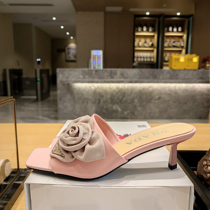 PRADA 26S OPEN TOE MULES 45MM IN BLUSH PINK PATENT CALFSKIN WITH ROSETTE