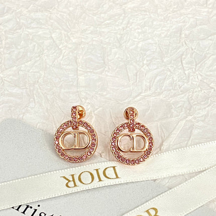 CD 26S CRYSTAL CIRCLE LOGO DROP EARRINGS IN ROSE GOLD TONE METAL 644468