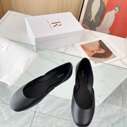THE ROW 26S ROUND TOE BALLET FLATS IN BLACK CALFSKIN