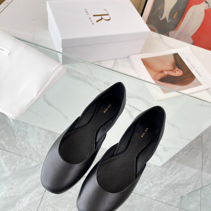 THE ROW 26S ROUND TOE BALLET FLATS IN BLACK CALFSKIN
