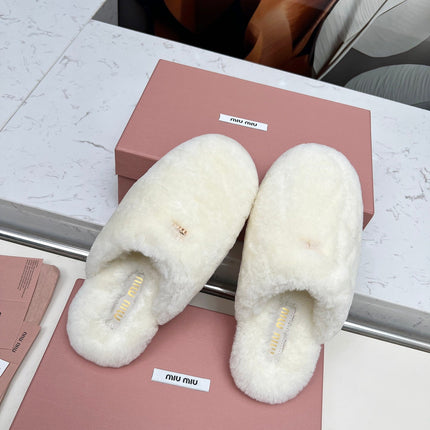 MIUMIU 26S MULES IN CREAM WHITE SHEARLING