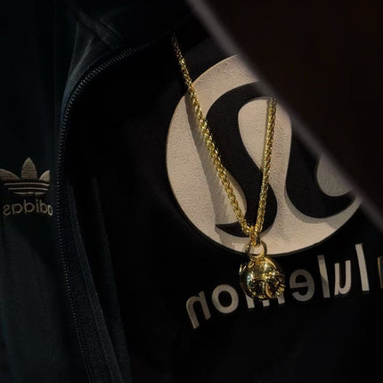 CHANEL 26S DOUBLE C LOGO SPHERE PENDANT CHAIN NECKLACE IN GOLD METAL 630892