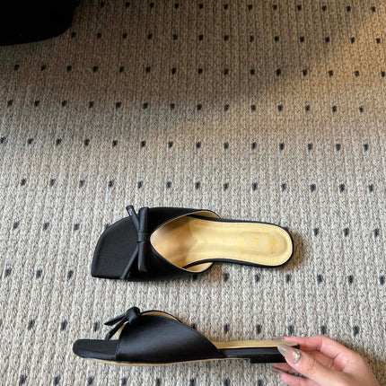 DIOR 26S OBLIQUE BOW MULE IN BLACK SATIN