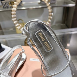 MIUMIU 26S MARY JANE FLATS IN SILVER CALFSKIN