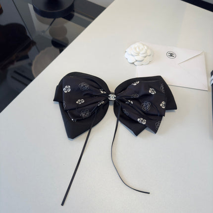 CHANEL 26S BOW HAIR CLIP IN BLACK SATIN 503133