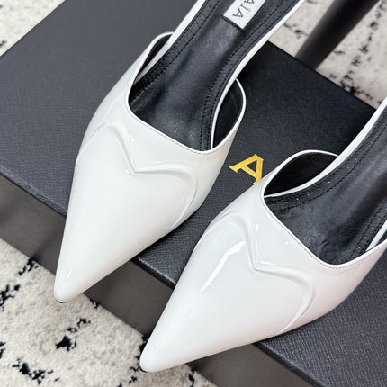 ALAIA 26S HEELED MULES 65 MM IN WHITE GLOSSY CALFSKIN