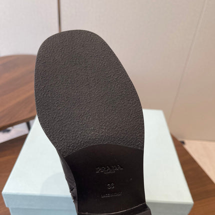 PRADA 25S COWBOY BOOTS IN DARK BLACK-BROWN CALFSKIN