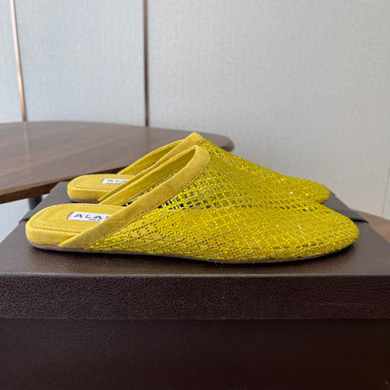ALAIA 26S FLAT MULES IN DARK YELLOW SUEDE AND MESH RHINESTONE-EMBELLISHED