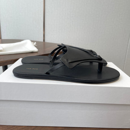 THE ROW 26S T STRAP THONG SANDALS IN BLACK CALFSKIN