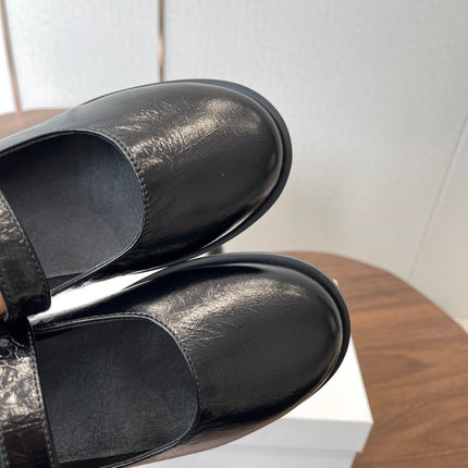 THE ROW 26S MARY JANE FLATS IN BLACK PATENT CALFSKIN