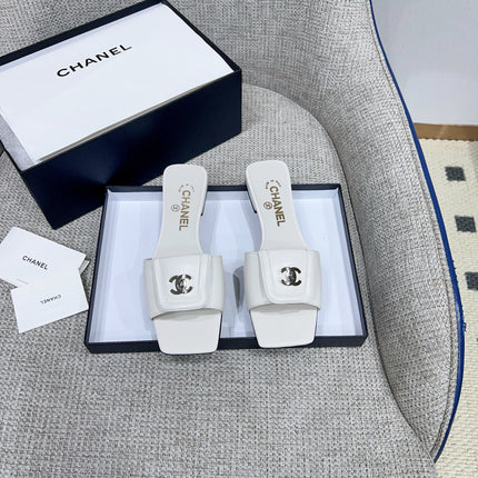 CHANEL 26S FLAT SLIDES IN WHITE LAMBSKIN