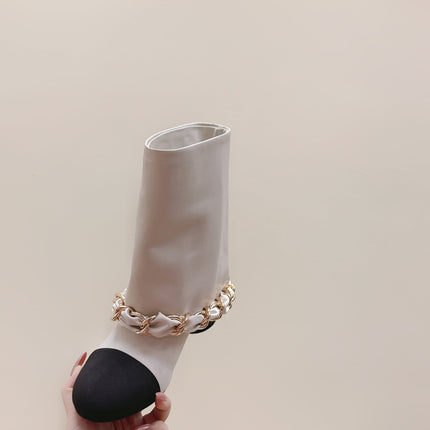 CHANEL 25S CALF-LENGTH BOOTS 45MM IN WHITE AND BLACK CALFSKIN GOLD HARDWARE