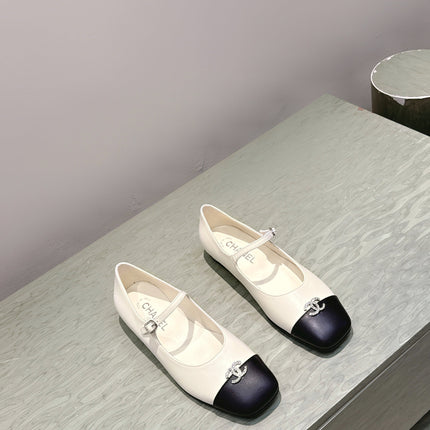 CHANEL 25S MARY JANE FLATS IN IVORY LAMBSKIN WITH BLACK CAP TOE SILVER HARDWARE