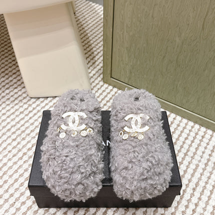 CHANEL 25S CLASSIC FURRY SLIDES IN GRAY WITH DOUBLE C LOGO