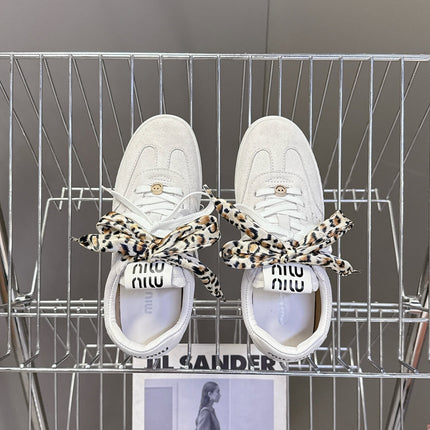 MIUMIU 25S SNEAKERS IN WHITE SUEDE WITH LEOPARD-PRINT LACES
