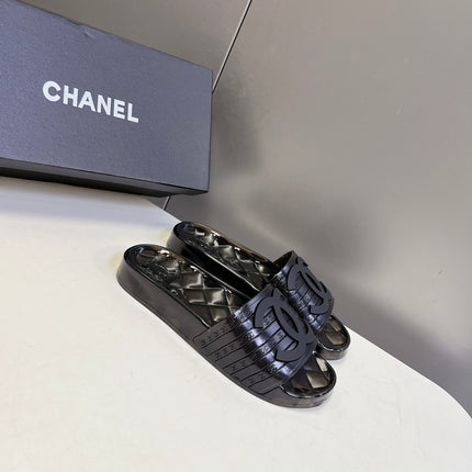 CHANEL 26S SLIDES IN BLACK PVC