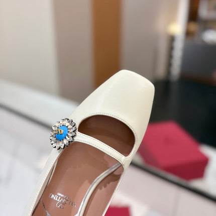 VALENTINO 26S MARY JANE FLATS IN WHITE CALFSKIN WITH CRYSTAL FLOWER