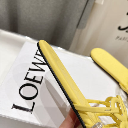 LOEWE 26S PETAL ANAGRAM SLIDE IN YELLOW CALFSKIN