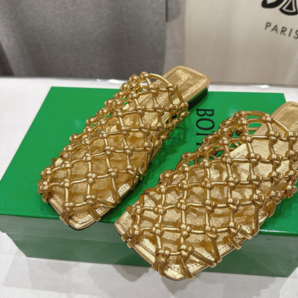 BOTTEGA VENETA 26S WOVEN MULES IN GOLD LAMBSKIN