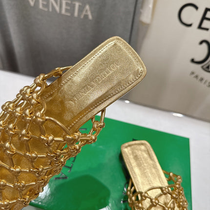 BOTTEGA VENETA 26S WOVEN MULES IN GOLD LAMBSKIN