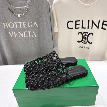 BOTTEGA VENETA 26S WOVEN MULES IN BLACK LAMBSKIN