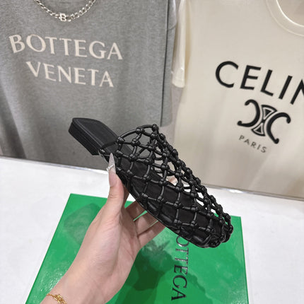 BOTTEGA VENETA 26S WOVEN MULES IN BLACK LAMBSKIN