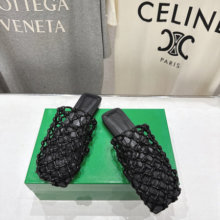 BOTTEGA VENETA 26S WOVEN MULES IN BLACK LAMBSKIN