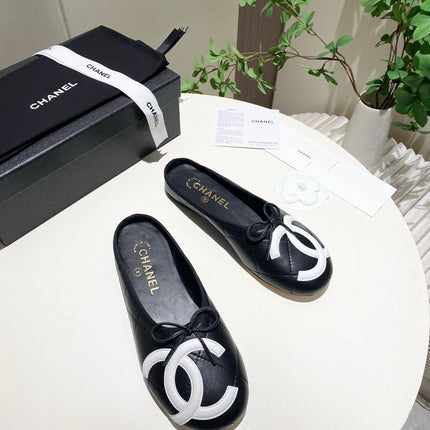 CHANEL 26S FLAT MULES IN BLACK LAMBSKIN