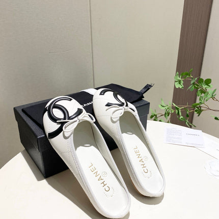 CHANEL 26S FLAT MULES IN WHITE LAMBSKIN