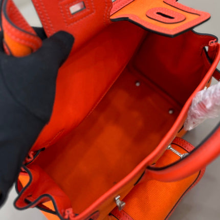 HM 25S BIRKIN CARGO 25 CM IN DARK ORANGE CANVAS AND SWIFT WITH SILVER HARDWARE
