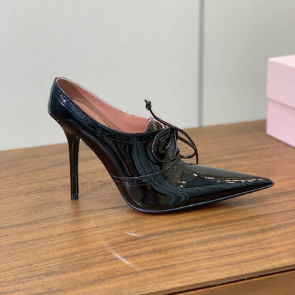 ALAIA 26S LACE-UP HEELED 105 MM IN BLACK GLOSSY CALFSKIN