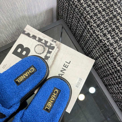 CHANEL 26S SLIDE SANDALS IN BLACK AND BLUE SHEARLING OPEN TOE