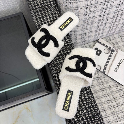 CHANEL 26S SLIDE SANDALS IN BLACK AND WHITE SHEARLING SQUARE TOE