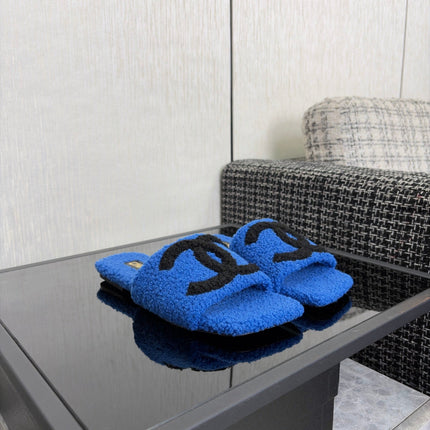 CHANEL 26S SLIDE SANDALS IN BLACK AND BLUE SHEARLING SQUARE TOE