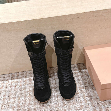 MIUMIU 25S ANKLE BOOTS IN BLACK SUEDE WITH SHEARLING