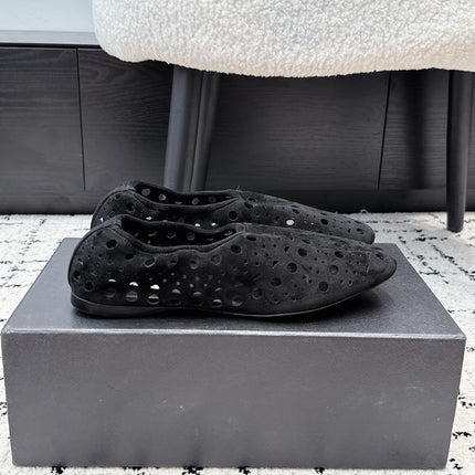 ALAIA 26S FLAT SLIP-ONS IN BLACK SUEDE WITH OPENWORK PATTERN