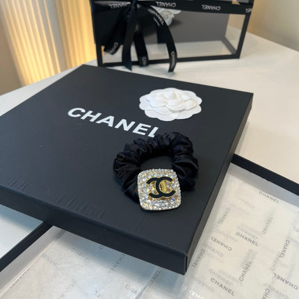 CHANEL 26S HAIR TIE IN BLACK FABRIC 503108