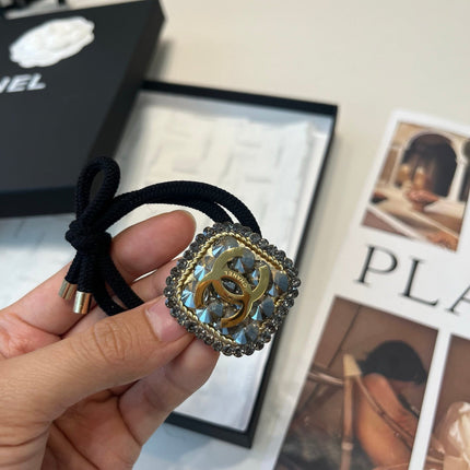 CHANEL 26S HAIR TIE IN BLACK FABRIC 503109