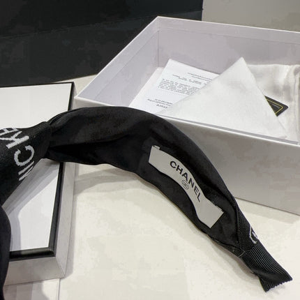 CHANEL 26S HEADBAND IN BLACK FABRIC 503083