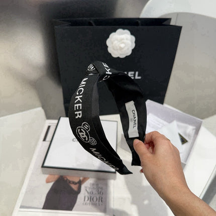 CHANEL 26S HEADBAND IN BLACK FABRIC 503083