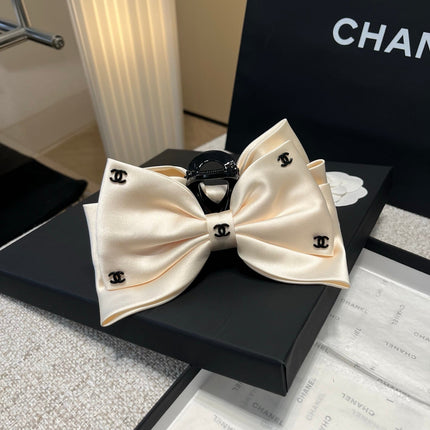 CHANEL 26S BOW HAIR CLIP IN WHITE RIBBON 512127