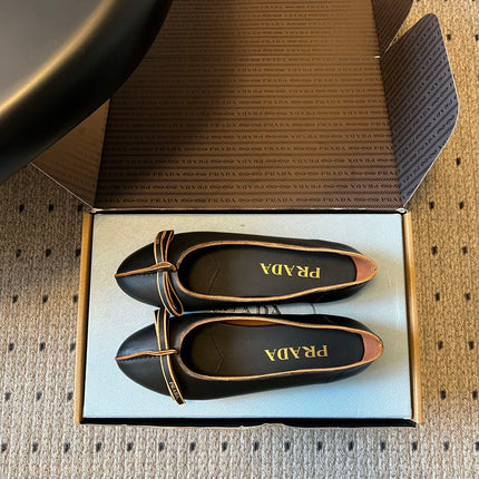PRADA 26S POINTED TOE BOW FLATS IN BLACK CALFSKIN