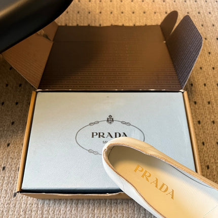 PRADA 26S POINTED TOE BOW FLATS IN IVORY WHITE CALFSKIN